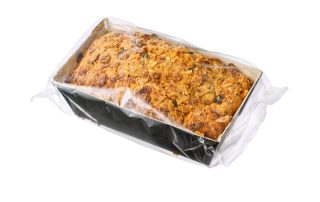 Nut,Cake,In,Plastic,Wrapper,Isolated,On,White.